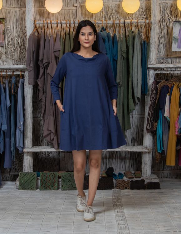 Seeking Out Summer Sunshine At The Bahamas South American Influence Bohemian Knit Dress Featuring Cute Pockets And Stylish Boat Neckline